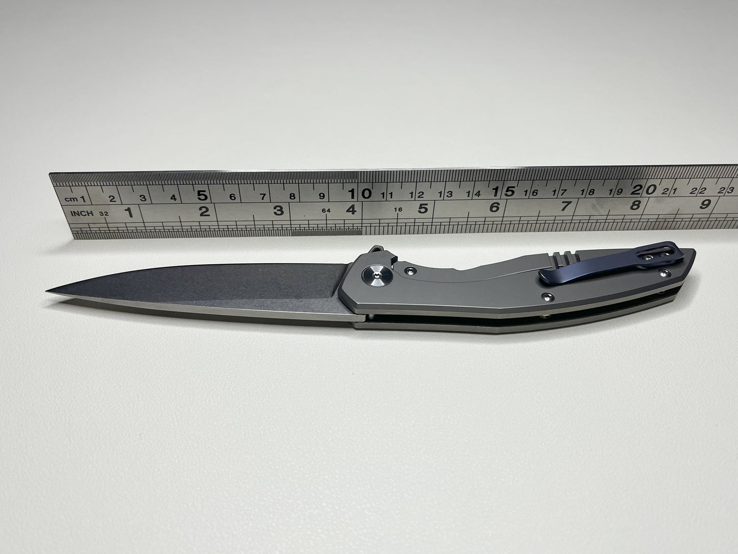 Titanium alloy folding knife, bearing assisted