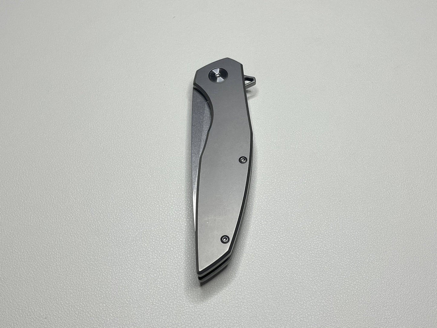 Titanium alloy folding knife, bearing assisted