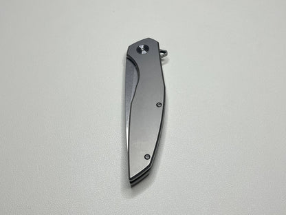 Titanium alloy folding knife, bearing assisted